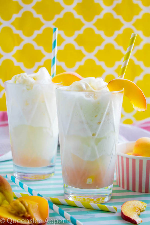 These Peaches and Cream Floats are a super delicious and refreshing drink. Scoops of creamy vanilla ice cream topped with a sparkling peach beverage and club soda. This fizzy drink is perfect for a hot summer day!  