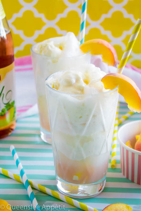 These Peaches and Cream Floats are a super delicious and refreshing drink. Scoops of creamy vanilla ice cream topped with a sparkling peach beverage and club soda. This fizzy drink is perfect for a hot summer day!  