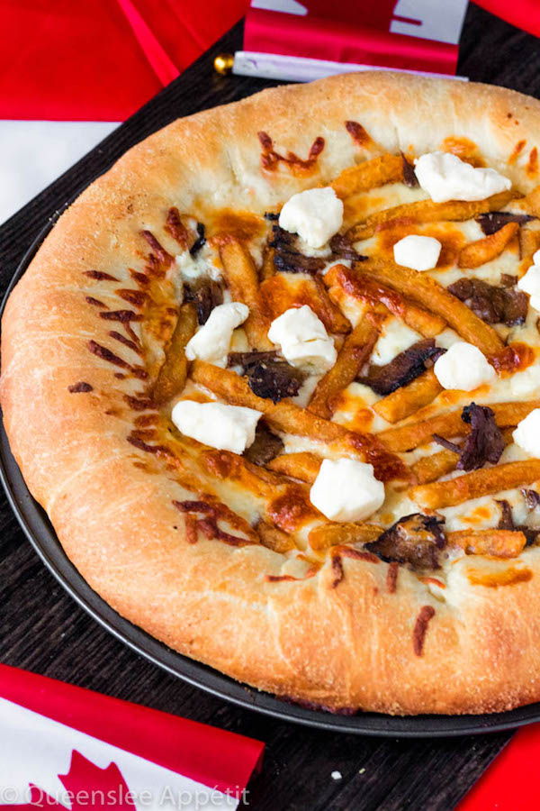 This classic Canadian dish just got better! This Poutine Pizza is topped with poutine gravy, shredded mozzarella and white cheddar cheese, crispy fries, steak and chunks of white cheddar cheese curds! To take it to the next level, the crust is stuffed with cheese! 