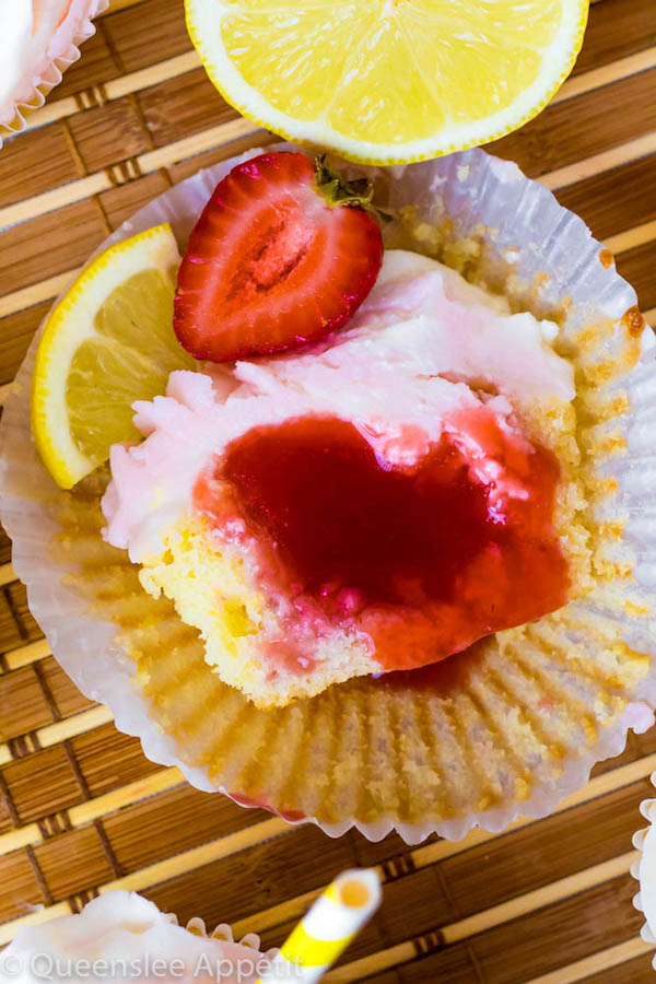 These Strawberry Lemon Cupcakes start with a moist, light and fluffy lemon cupcake that’s filled with homemade strawberry sauce and topped with fresh lemon and strawberry frosting.