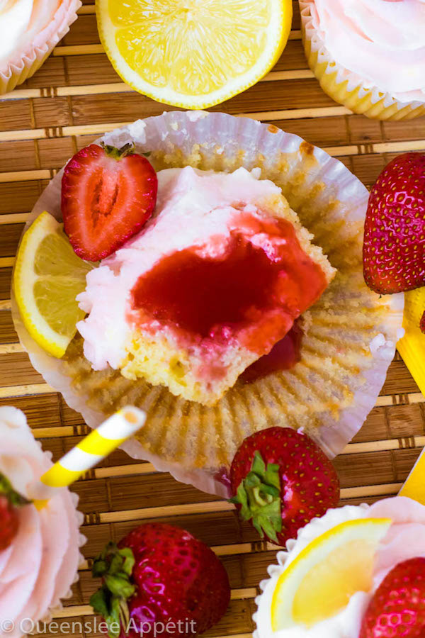 These Strawberry Lemon Cupcakes start with a moist, light and fluffy lemon cupcake that’s filled with homemade strawberry sauce and topped with fresh lemon and strawberry frosting.