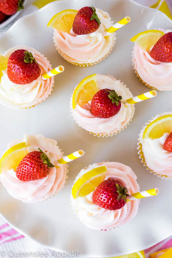 These Strawberry Lemon Cupcakes start with a moist, light and fluffy lemon cupcake that’s filled with homemade strawberry sauce and topped with fresh lemon and strawberry frosting.