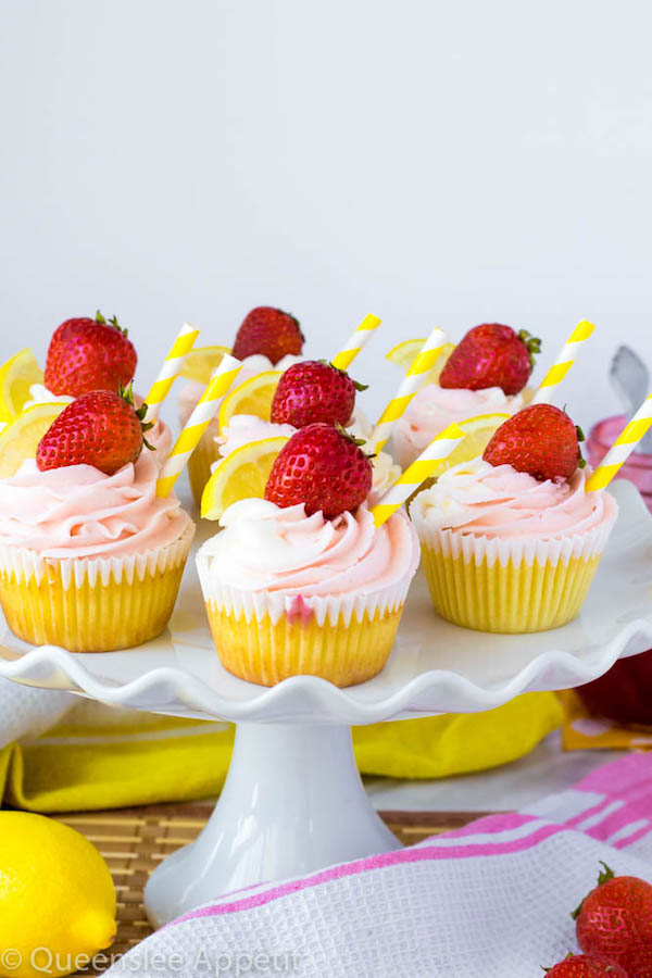 These Strawberry Lemon Cupcakes start with a moist, light and fluffy lemon cupcake that’s filled with homemade strawberry sauce and topped with fresh lemon and strawberry frosting.