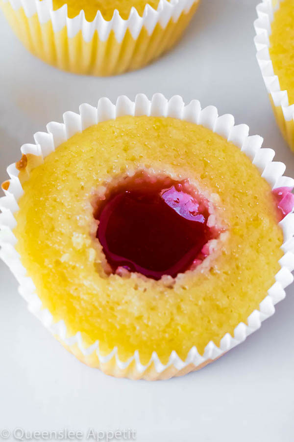 These Strawberry Lemon Cupcakes start with a moist, light and fluffy lemon cupcake that’s filled with homemade strawberry sauce and topped with fresh lemon and strawberry frosting.