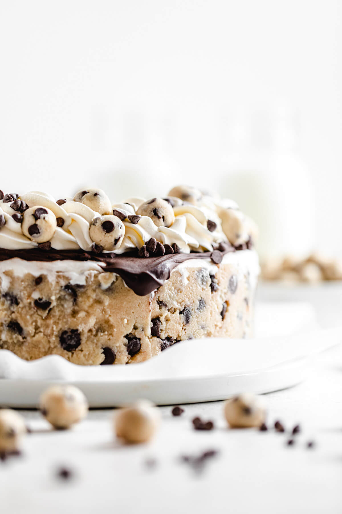 close up side view of ice cream cake with cookie dough crust