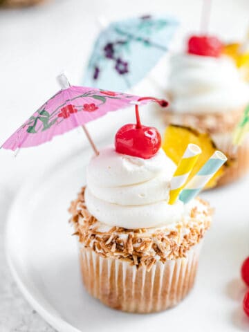 close up of cupcake on a white plate