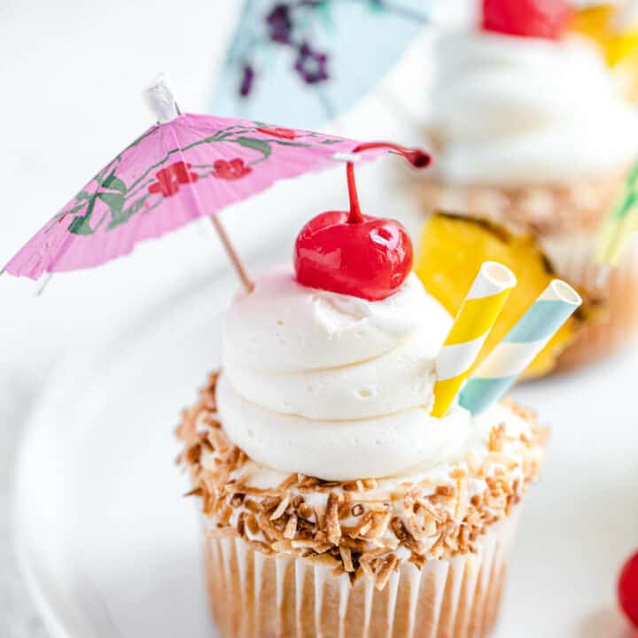 close up of cupcake on a white plate