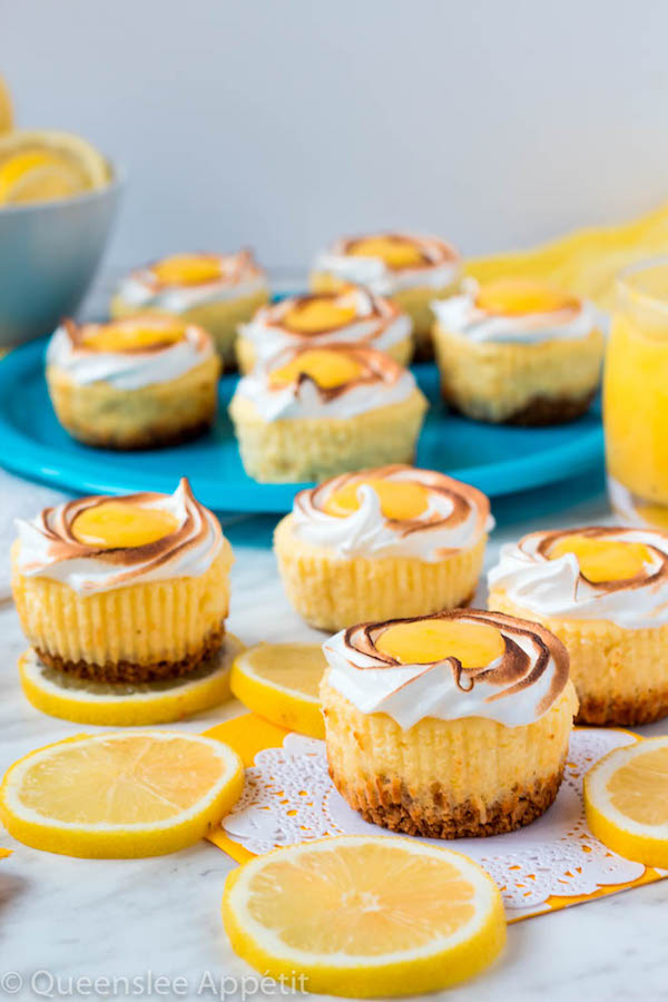 These Mini Lemon Meringue Cheesecakes are incredibly delicious and full of fresh lemon flavour! They’re made with a buttery graham cracker crust, creamy lemon cheesecake filling, and are topped with a ring of toasted meringue with tart lemon curd in the centre. A fun bite-sized treat for summer!