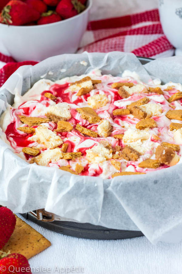 This No-Churn Strawberry Cheesecake Ice Cream consists of a cheesecake flavoured ice cream base that’s loaded with cheesecake and graham cracker pieces and a swirl of sweet homemade strawberry sauce. This simple and delicious dessert just screams summer!