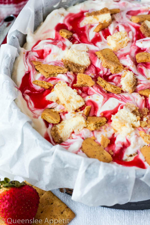 This No-Churn Strawberry Cheesecake Ice Cream consists of a cheesecake flavoured ice cream base that’s loaded with cheesecake and graham cracker pieces and a swirl of sweet homemade strawberry sauce. This simple and delicious dessert just screams summer!