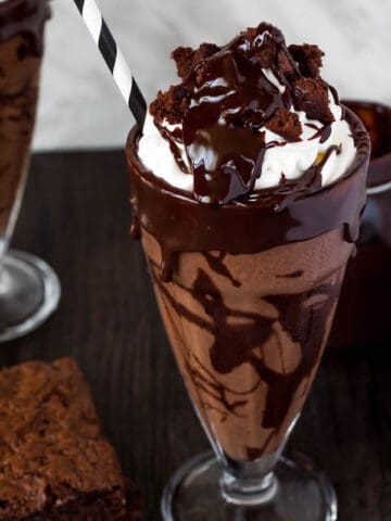 This Brownie Milkshake is a super decadent treat every chocolate lover should taste at least once! Loaded with brownie chunks and decorated with ganache, this milkshake is packed with delicious chocolate flavour.