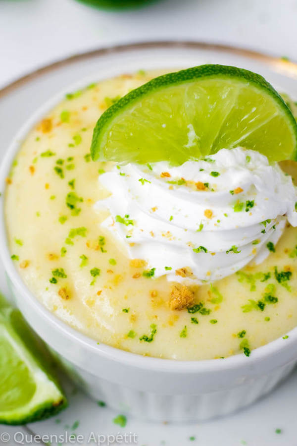 This Key Lime Pie Pudding is sweet, tangy and creamy. Each bite tastes just like a key lime pie! Top this key lime pudding off with whipped cream, crushed graham crackers and a slice of lime for a delightful summer treat! 