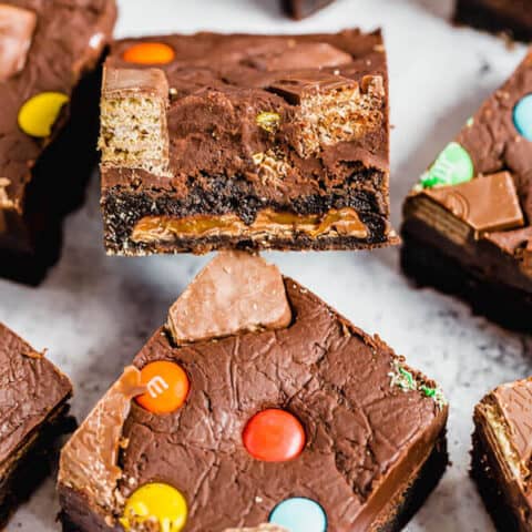 brownies topped with fudge and stuffed with halloween candy