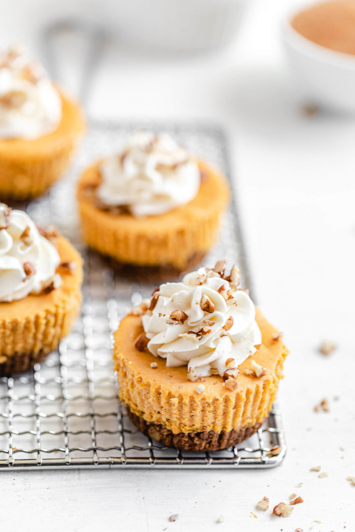 mini cheesecakes on a wire safety grater