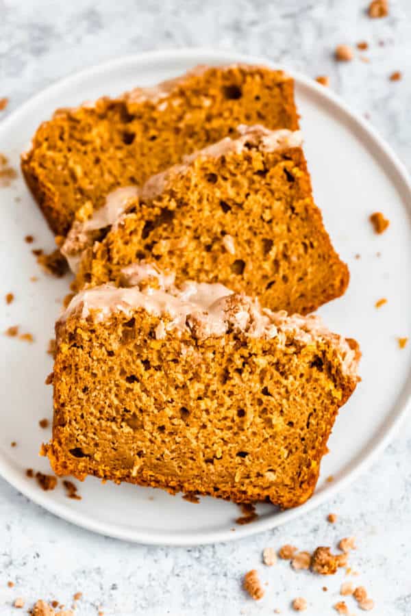 three slices of pumpkin streusel bread on a plate