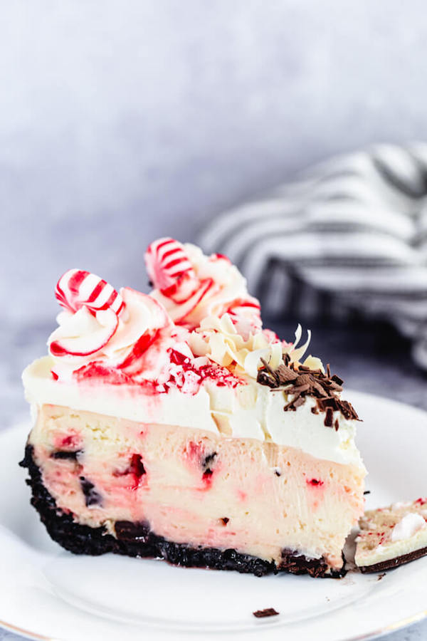 slice of peppermint cheesecake on a white plate
