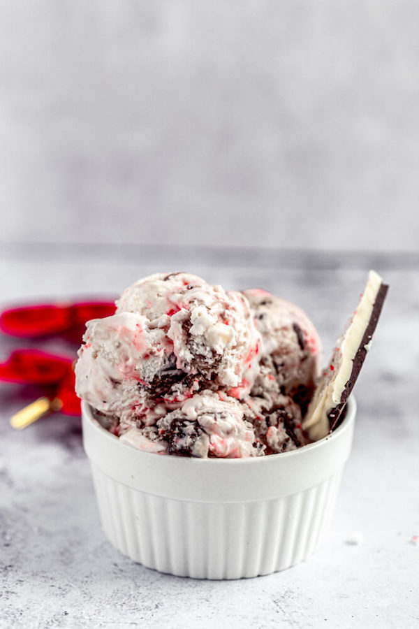 ice cream in a ramekin with peppermint bark on side