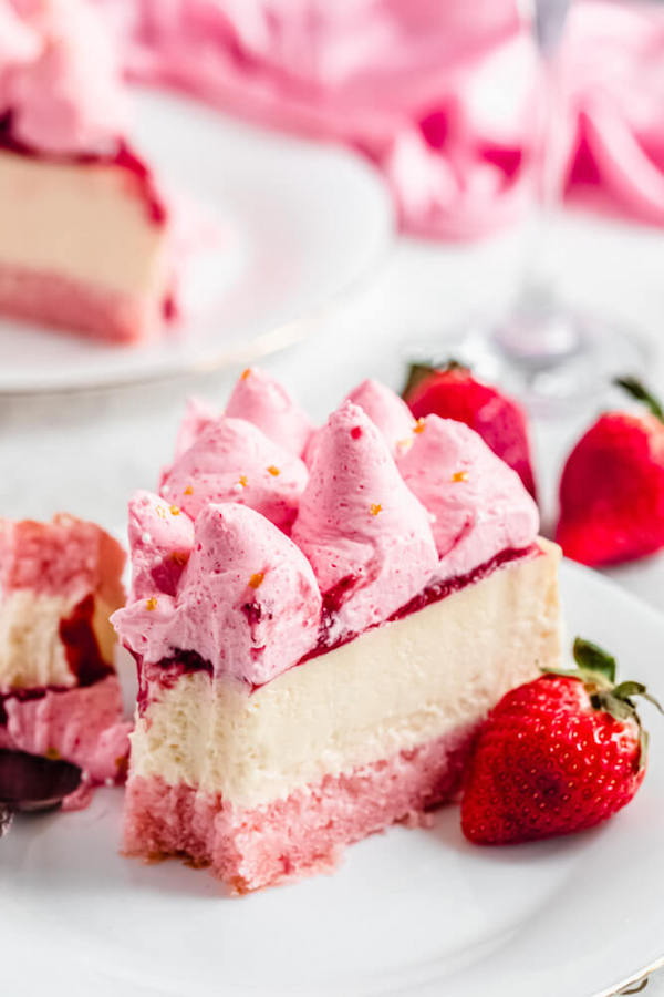 close up of champagne flavoured cheesecake slice on plate