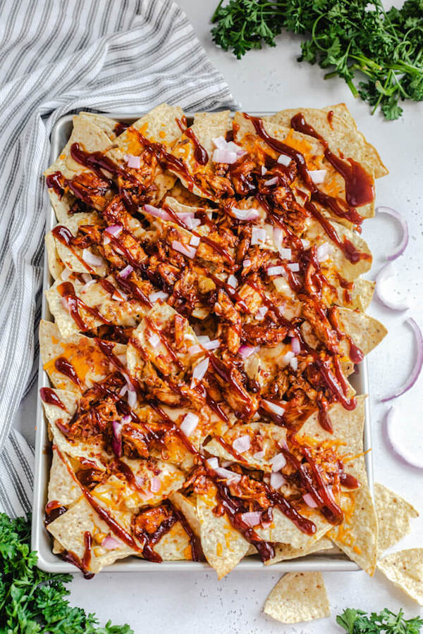 barbecue chicken nachos on a sheet pan