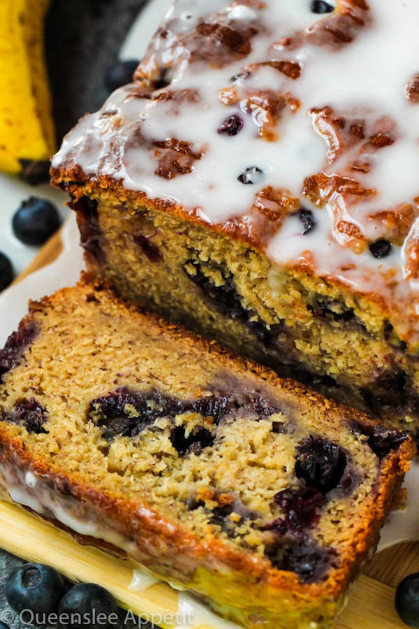 This Blueberry Banana Bread is soft, moist and fluffy and packed with fresh blueberries. Top it off with a sweet lemon glaze for a burst of citrus flavours!   