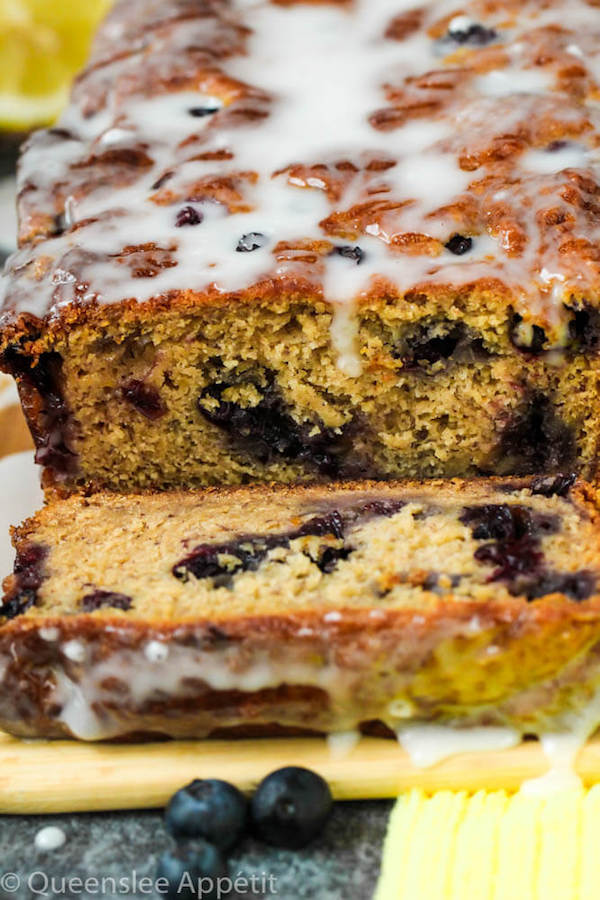 This Blueberry Banana Bread is soft, moist and fluffy and packed with fresh blueberries. Top it off with a sweet lemon glaze for a burst of citrus flavours!   