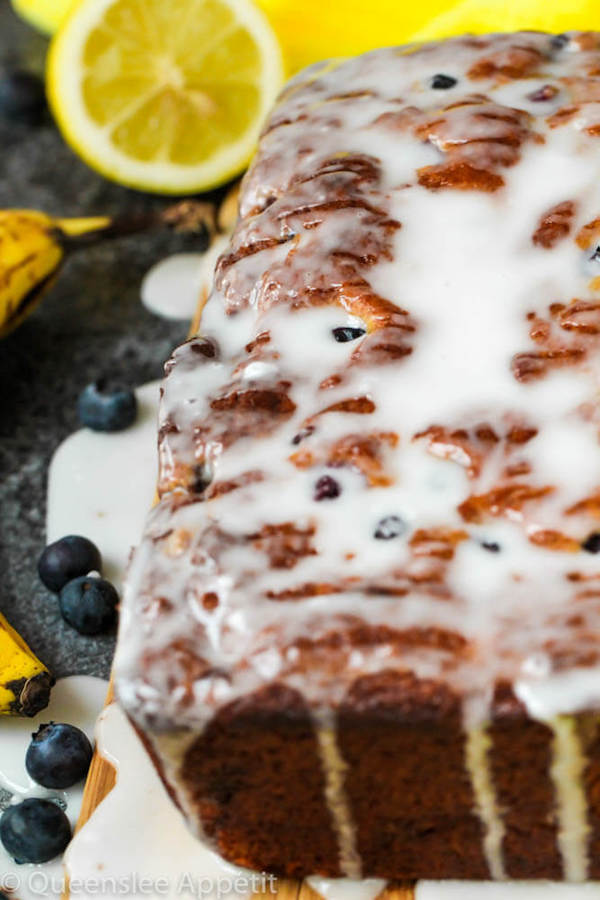 This Blueberry Banana Bread is soft, moist and fluffy and packed with fresh blueberries. Top it off with a sweet lemon glaze for a burst of citrus flavours!   