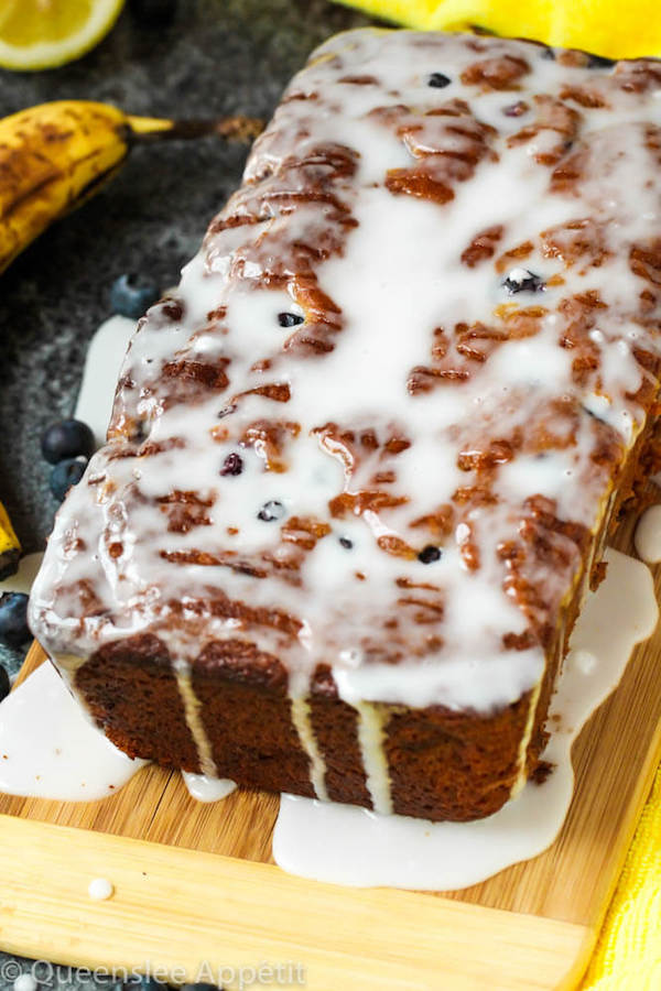 This Blueberry Banana Bread is soft, moist and fluffy and packed with fresh blueberries. Top it off with a sweet lemon glaze for a burst of citrus flavours!   