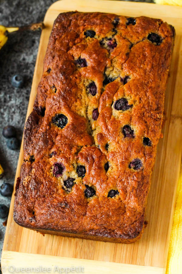 This Blueberry Banana Bread is soft, moist and fluffy and packed with fresh blueberries. Top it off with a sweet lemon glaze for a burst of citrus flavours!   