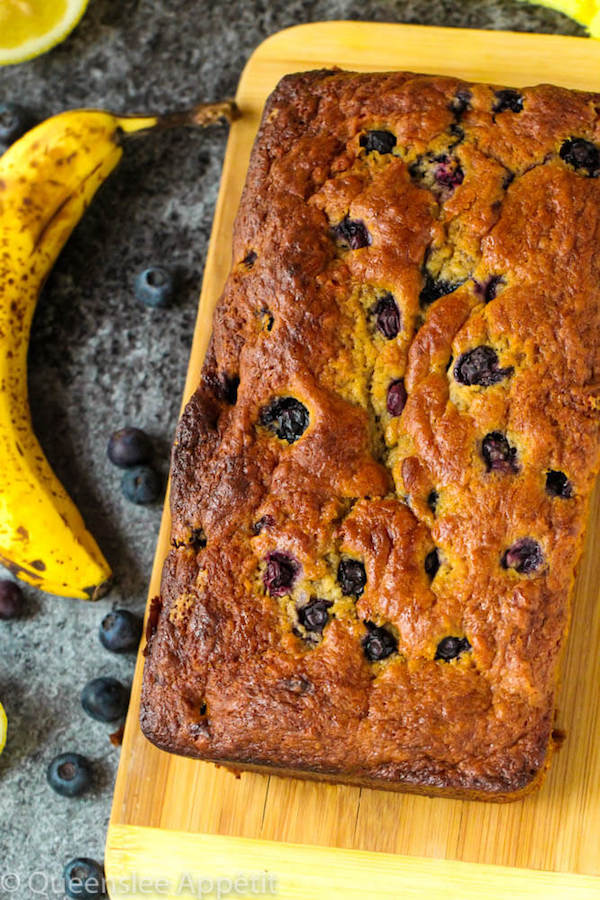 This Blueberry Banana Bread is soft, moist and fluffy and packed with fresh blueberries. Top it off with a sweet lemon glaze for a burst of citrus flavours!   