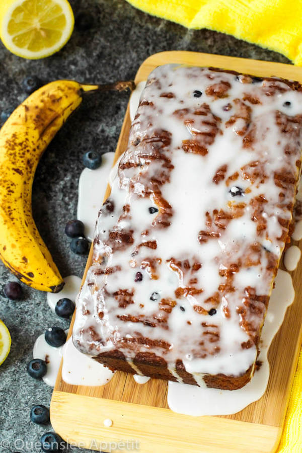 This Blueberry Banana Bread is soft, moist and fluffy and packed with fresh blueberries. Top it off with a sweet lemon glaze for a burst of citrus flavours!   