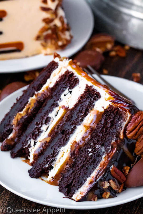 This Turtle Chocolate Layer Cake starts with rich, decadent and moist chocolate cake layers that are filled with a caramel pecan sauce and covered in a smooth caramel frosting, then finished off with a caramel and ganache drip and chopped pecans! 