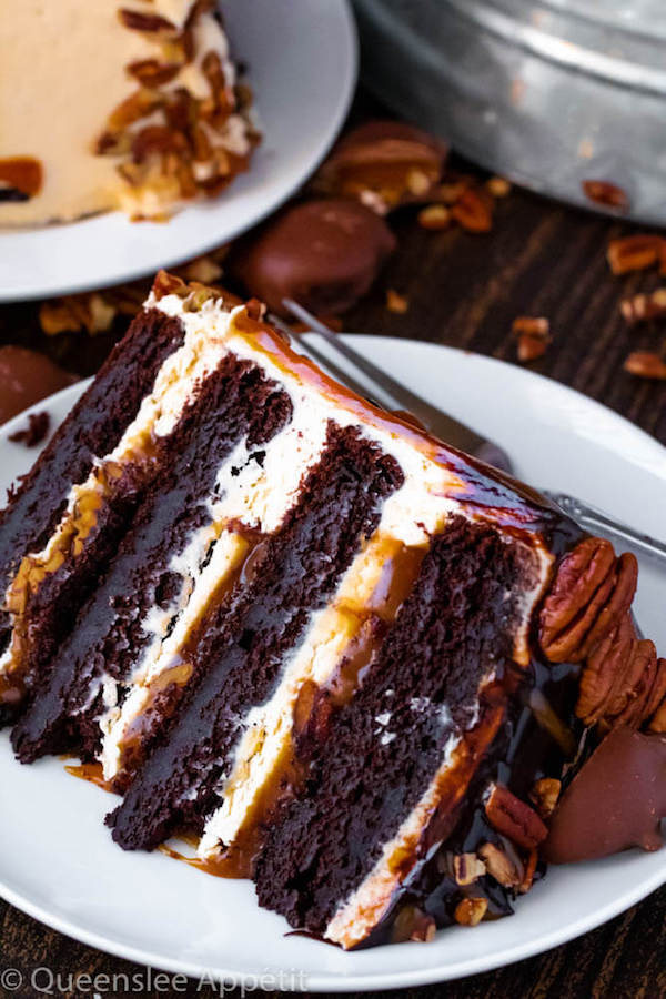 This Turtle Chocolate Layer Cake starts with rich, decadent and moist chocolate cake layers that are filled with a caramel pecan sauce and covered in a smooth caramel frosting, then finished off with a caramel and ganache drip and chopped pecans! 