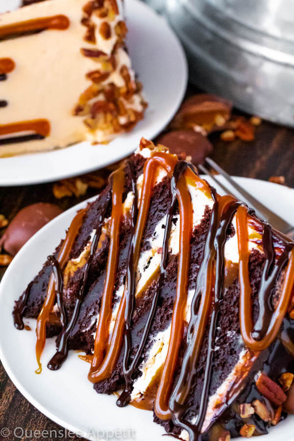 This Turtle Chocolate Layer Cake starts with rich, decadent and moist chocolate cake layers that are filled with a caramel pecan sauce and covered in a smooth caramel frosting, then finished off with a caramel and ganache drip and chopped pecans! 