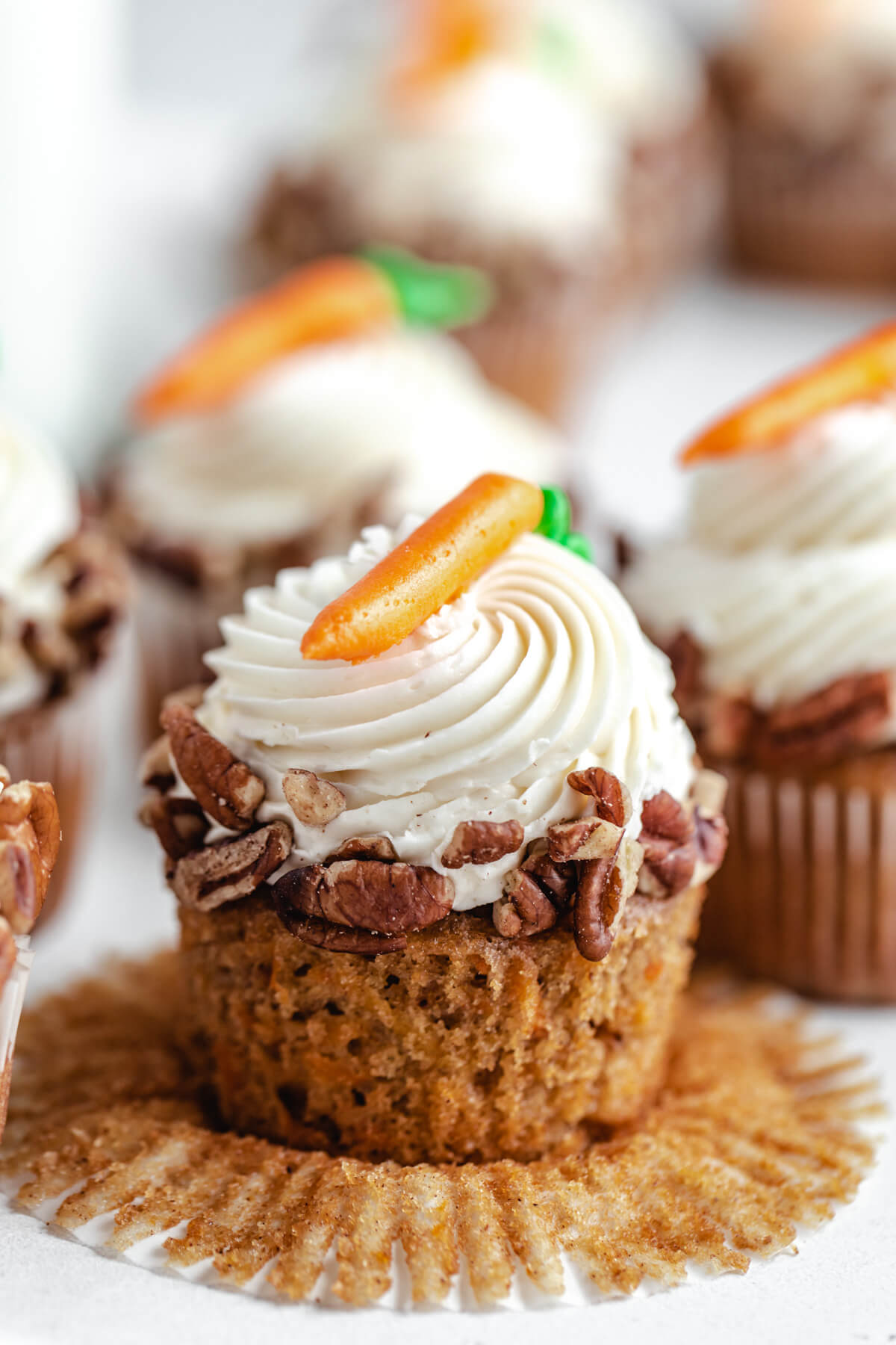 close up of unwrapped carrot cupcake 