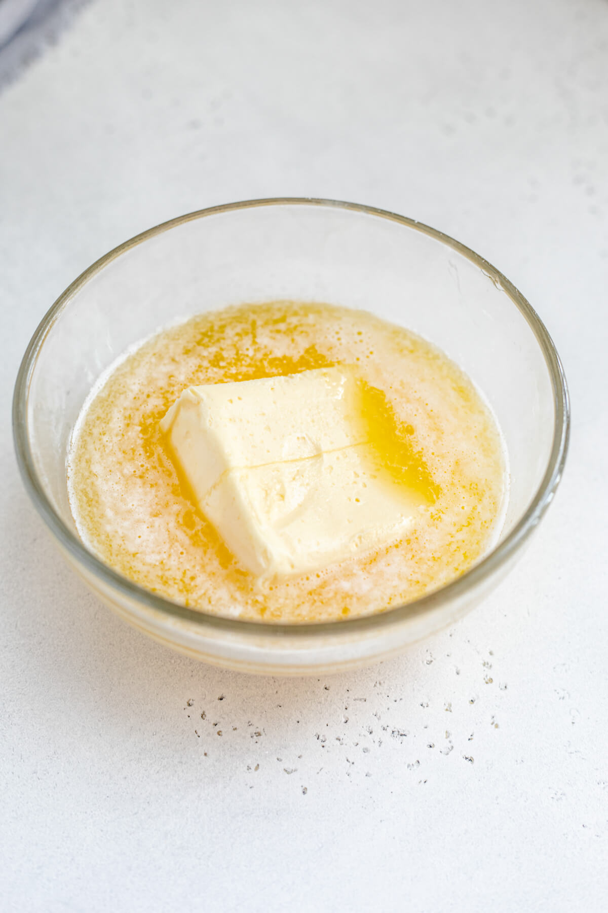 half melted butter in a glass bowl