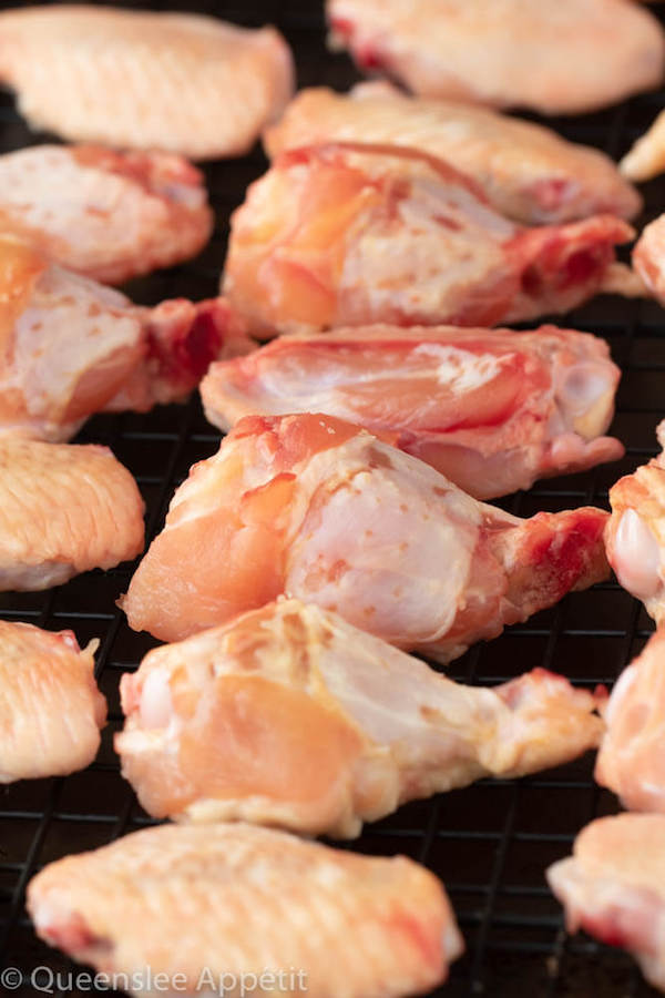 drying chicken wings on a rack