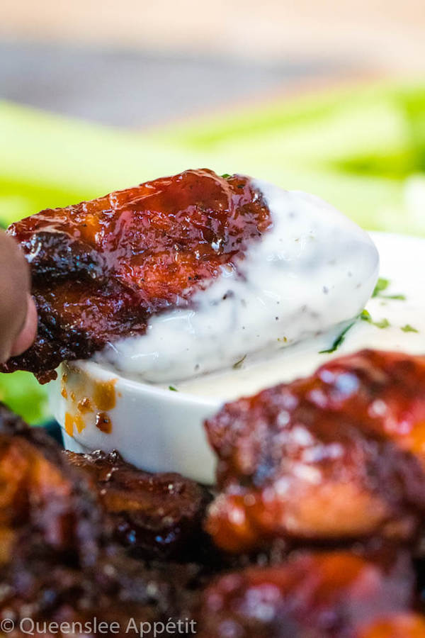 Honey BBQ Chicken Wings dipped in Ranch dressing