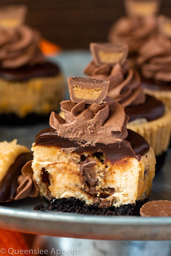 Mini Reese's Peanut Butter Cheesecakes cut in half with Reese's in the middle