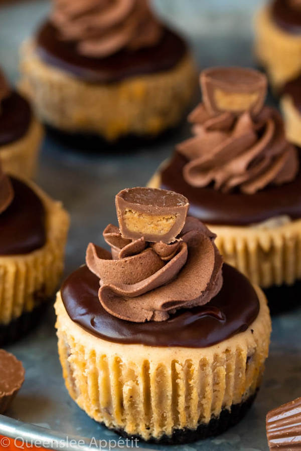 Mini Reese's Peanut Butter Cheesecakes on a cake stand