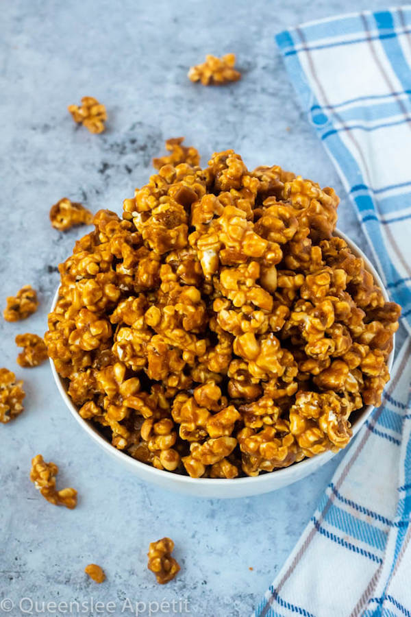 This Homemade Caramel Popcorn is made with a delicious homemade caramel sauce for a sweet, buttery, crunchy and fun snack that’s far better than the store-bought version! 