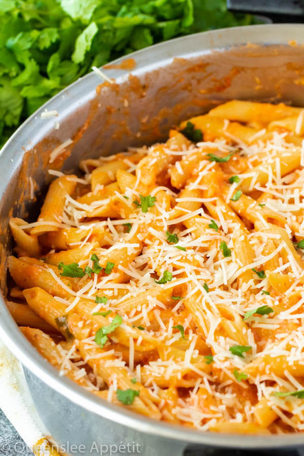 penne alla vodka pasta recipe with parmesan and chopped parsley on top