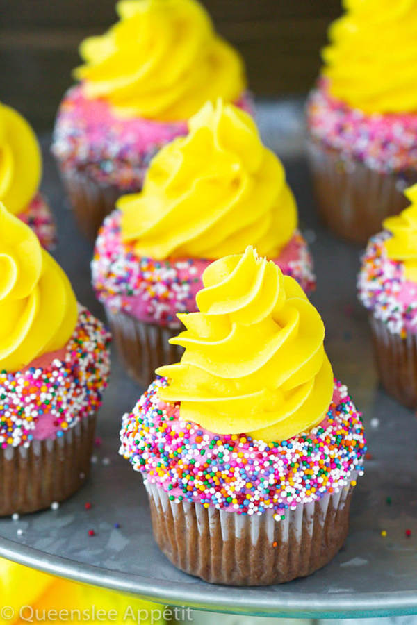 moist and delicious banana cupcake that’s been decorated with strawberry and vanilla buttercream and colourful sprinkles!