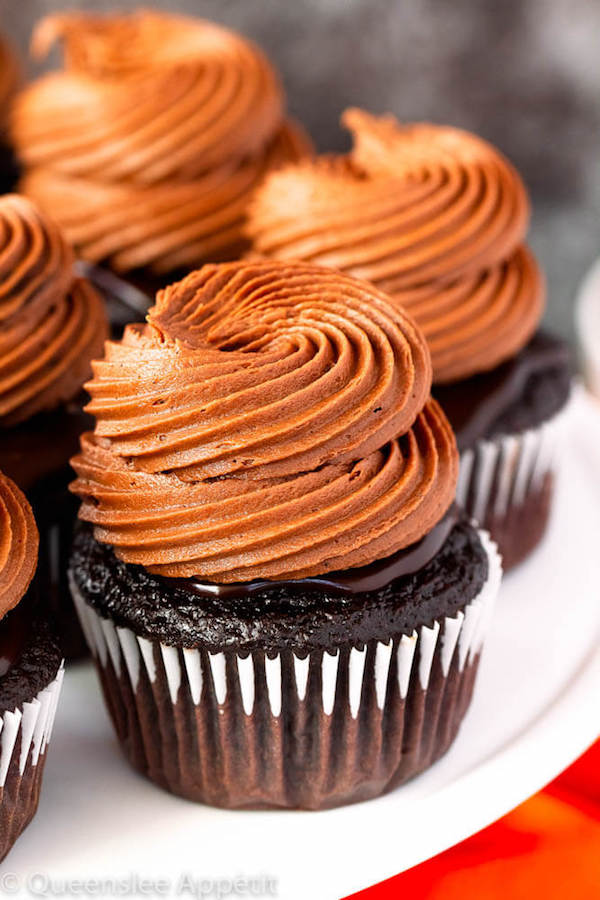 chocolate cupcakes with ganache, chocolate caramel cream cheese frosting on top