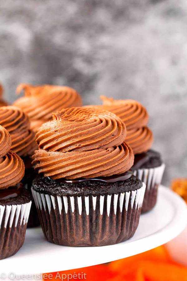 chocolate cupcakes with ganache, chocolate caramel cream cheese frosting on top