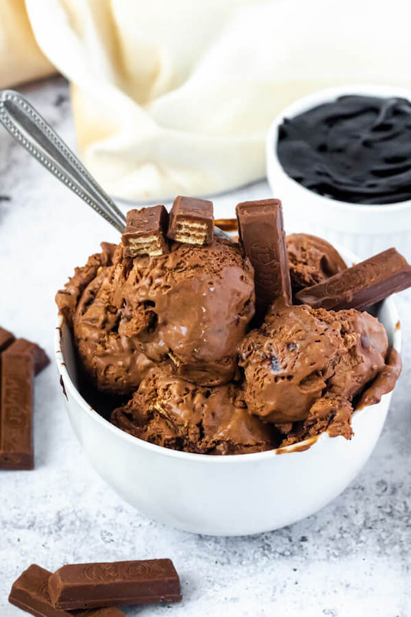 no-churn chocolate ice cream loaded with chopped kit-lats and swirled with hot fudge sauce