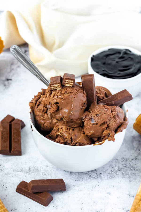 no-churn chocolate ice cream loaded with chopped kit-lats and swirled with hot fudge sauce