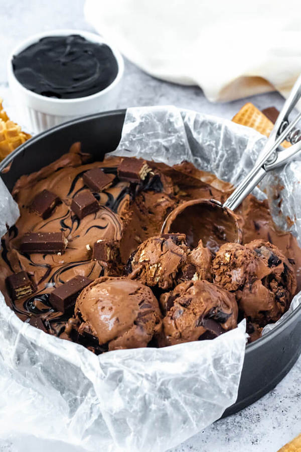 no-churn chocolate ice cream loaded with chopped kit-lats and swirled with hot fudge sauce