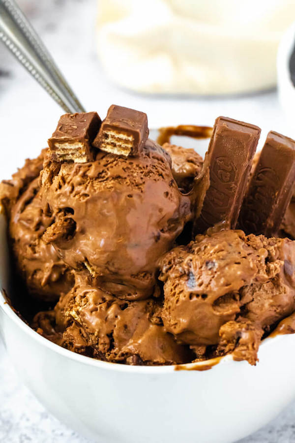 no-churn chocolate ice cream loaded with chopped kit-lats and swirled with hot fudge sauce