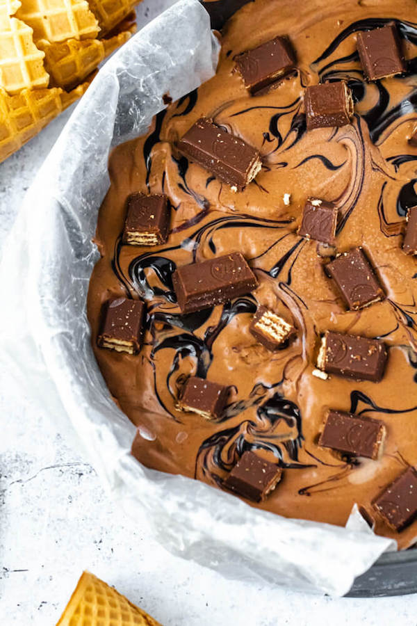 no-churn chocolate ice cream loaded with chopped kit-lats and swirled with hot fudge sauce