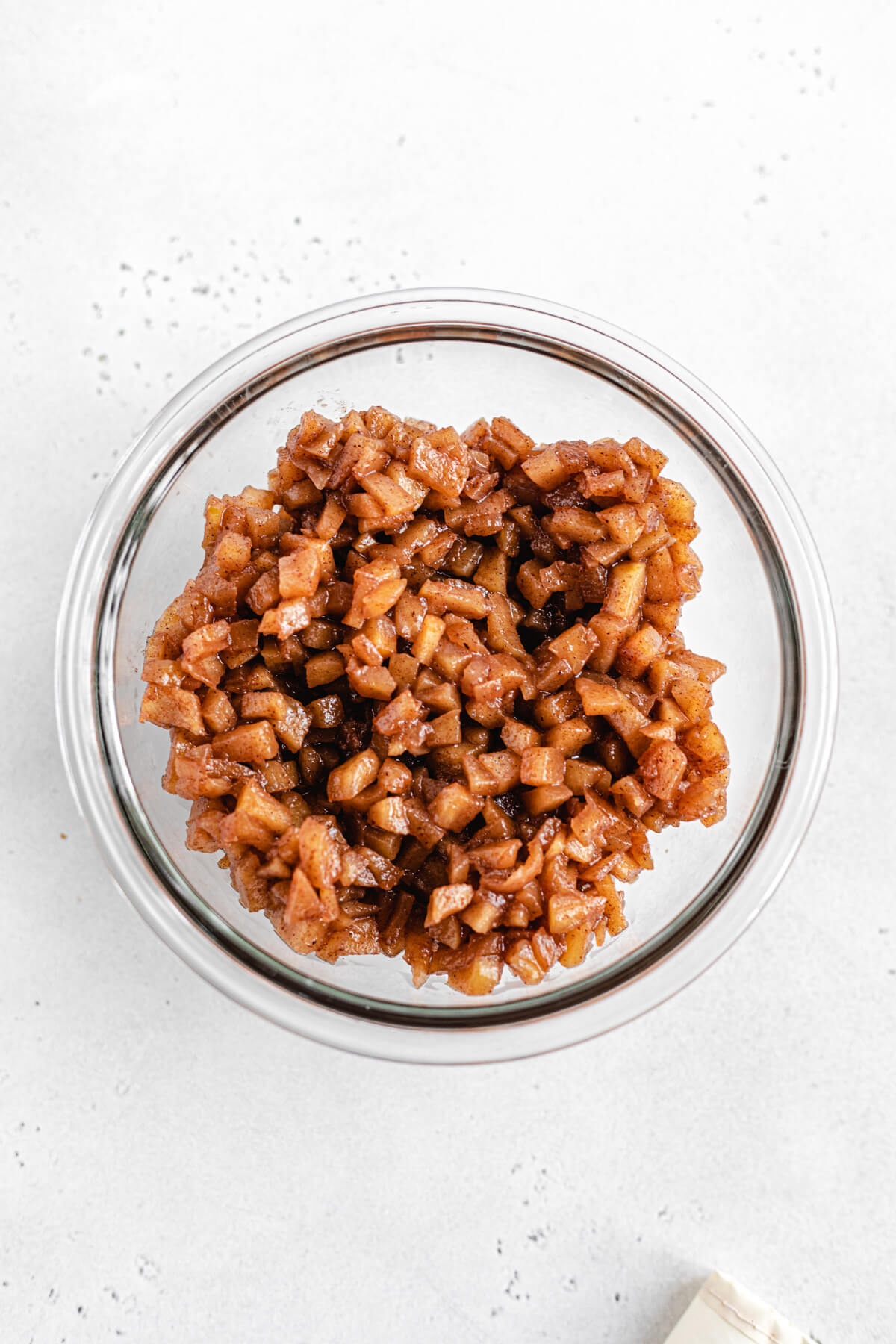 glass bowl filled with apple pie filling